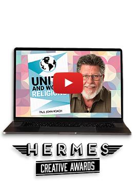 A headshot of Paul John Roach next to the book cover for Unity and World Religions on a colorful background on a black laptop with the Hermes Creative Awards logo