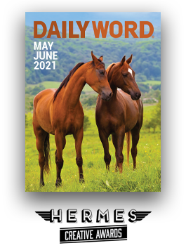 The cover of May/June 2021 Daily Word with two brown horses standing in a field with the Hermes Creative Awards logo