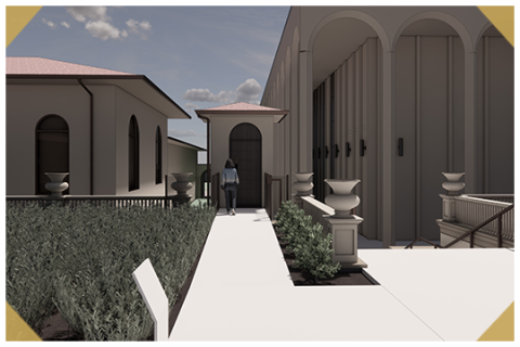 A woman walking in front of buildings at Unity Village